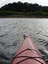photo of the front of a kayak from the perspective of the kayaker