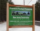 entrance sign to the Franklin Parker Preserve in Woodland Township
