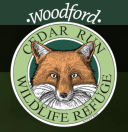 Logo of organization: image of a fox encircled by text