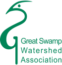 Organization logo: stylized depiction of a bird in green