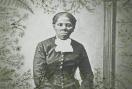 Greyscale image of Harriet Tubman overlaid with leaves